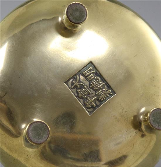 A Chinese bronze censer, ding, Xuande mark, 18th / 19th century, diameter 16.6cm, height 6.7cm